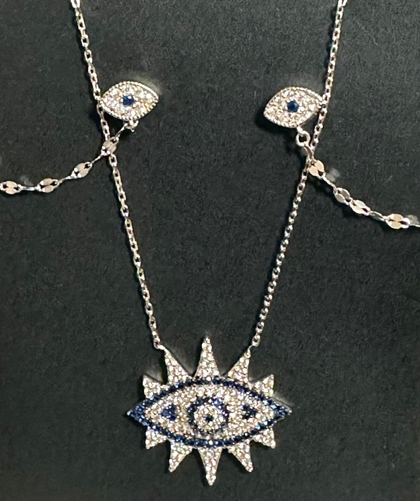 silver shining filled evil eye necklace